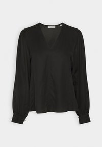 Blouse noire à manches longues avec col en V, épaules froncées et poignets boutonnés, présentée sur fond blanc.