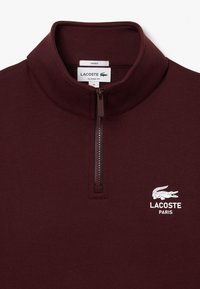 Lacoste Felpa - bordeaux bzd