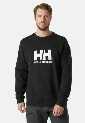 Sudadera negra con cuello redondo, mangas largas, y un logo blanco "HH" junto al texto "HELLY HANSEN" en la parte frontal. Textura de tela suave.