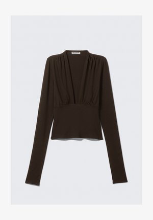 Brązowa bluzka z długim rękawem i dekoltem w serek, z marszczeniami na ramionach i dopasowaną talią. Wykonana z rozciągliwego materiału zapewniającego komfort.