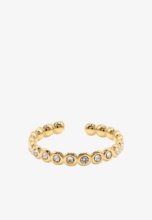 Anello aperto in oro con pietre preziose trasparenti distribuite uniformemente, incastonate in montature arrotondate lungo la fascia.