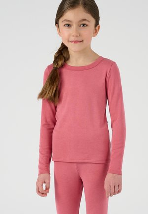 Top termico a maniche lunghe di colore rosa abbinato a leggings rosa coordinati, realizzati in un tessuto morbido con una texture liscia e un design semplice.