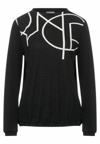 Svart långärmad topp med rund halsringning, med vita abstrakta linjemönster över framsidan och en rynkad nederkant. Mjuk tygtextur.