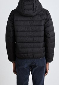 Tommy Jeans Zimní bunda - black