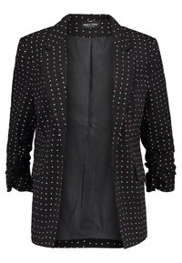 Blazer noir avec col à revers, présentant un motif à pois rouge et blanc. Confectionné dans un tissu lisse, il comporte deux rabats de poche.