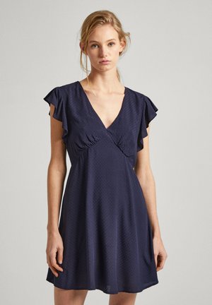 Vestido de marine con mangas cortas con volantes, escote en V, busto fruncido y falda acampanada. Hecho de una tela texturizada ligera.