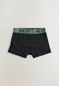 Svarta kalsonger i mjukt material. Har ett grönt elastiskt midjeband med "NEXT" tryckt i svart.