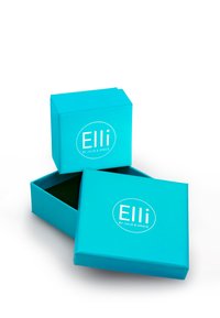 Turkise gaveæske med en glat finish, prydet med et hvidt cirkulært logo "Elli by Julie & Grace" og en mørkegrøn indvendig.