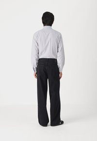 Abercrombie & Fitch ULTRA BAGGY - Vaqueros boyfriend - black
