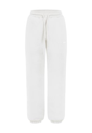 Białe dresowe spodnie z polaru z elastycznym paskiem w talii, sznurkiem do regulacji, bocznymi kieszeniami i elastycznymi manszetami przy kostkach.