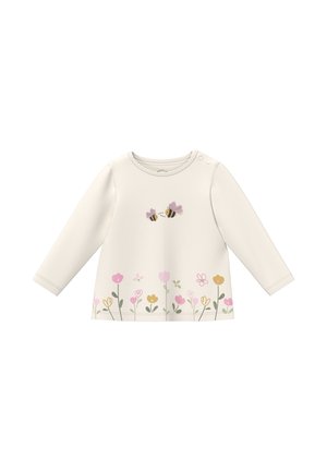 Roomkleurig babyshirt met lange mouwen, met twee bijen bij de borst en een rand van roze, gele en groene bloemen langs de zoom.