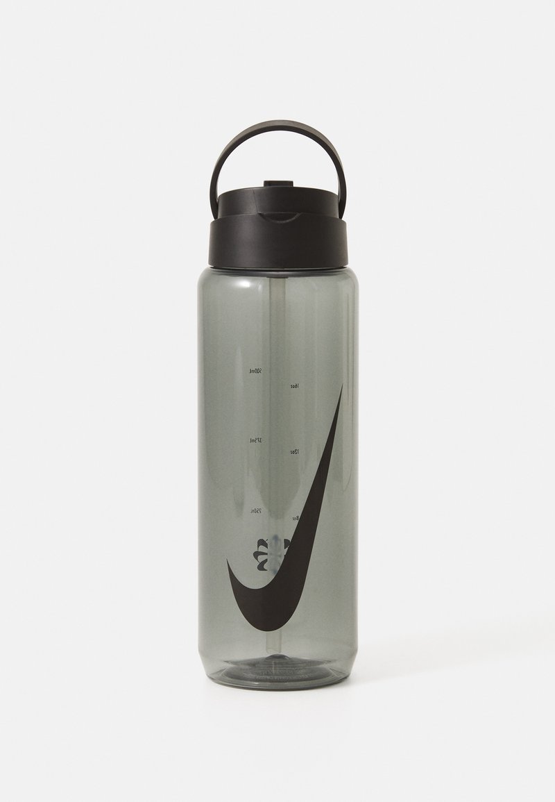 Clear plastic water bottle with a black lid and handle, featuring a black Nike logo and measurement markings on the side.