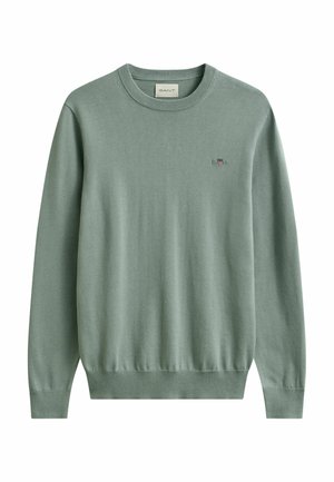 Hellgrüner Pullover mit langen Ärmeln und Rundhalsausschnitt, mit kleinem gesticktem GANT-Logo auf der linken Brust sowie gerippten Bündchen und Saum.