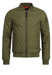 Olivgrüne, gesteppte Jacke mit geripptem Kragen, Reißverschluss vorne und Seitentaschen. Verfügt über eine Reißverschlusstasche am Ärmel und weiches, strukturiertes Material.