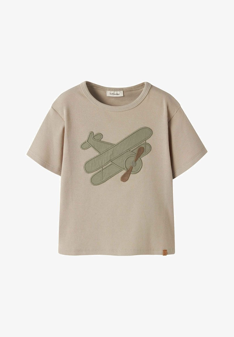 Maglietta beige a maniche corte per bambini con motivo a coste e applicazione di un biplano verde e marrone sul davanti.