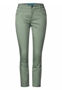 Slim-fit kalhoty ve světle zelené barvě, vyrobené z elastické tkaniny. Mají dvě přední kapsy a zapínání na knoflík v pase. Hladký povrch.