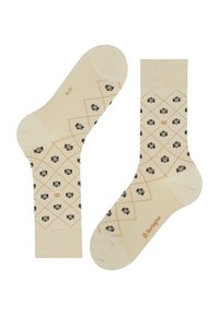 Cremfarbene Socken mit einem diamantartigen Muster, das kleine schwarze Kameragraphiken zeigt. Hergestellt aus einem weichen Material, mit einem gerippten Bund und Branding.