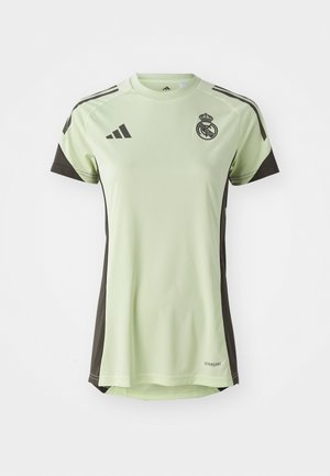 Light green athletic shirt with black accents, crew neckline, short sleeves, featuring the Real Madrid logo and Adidas branding.