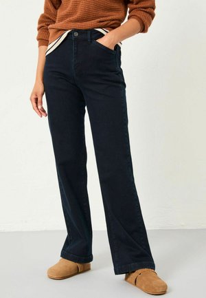 Dark blue wide-leg jeans with a classic fit, featuring a metal button closure, five pockets, and contrasting striped waistband.