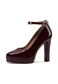 Scarpe con tacco alto in vernice bordeaux con cinturino alla caviglia, punta tonda e design con piattaforma. Finitura lucida e tacco grosso per maggior stabilità.