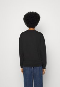 HUGO Sudadera - black