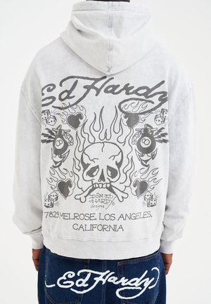 Grijze hoodie met een grafische print van een schedel, vlammen, dobbelstenen en harten op de achterkant. Gemaakt van een katoenmix met een casual pasvorm en capuchon.