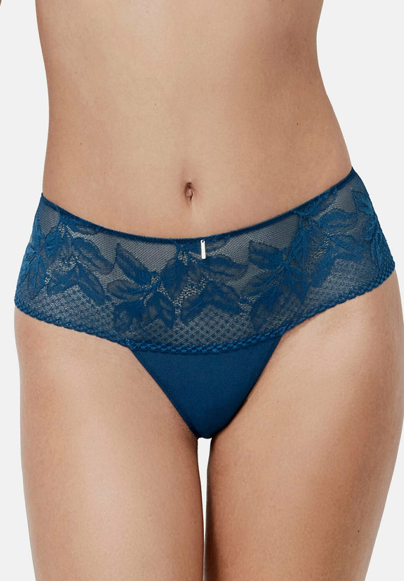 Teal kanten en mesh slipje met bloemmotieven op de tailleband, een gladde stof en golvende randen. Gouden details aan de voorkant.