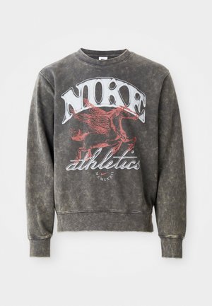 Gray crewneck sweatshirt with a faded, textured finish. Prominent red Nike logo and athletic graphic on the front. Long sleeves and ribbed cuffs.