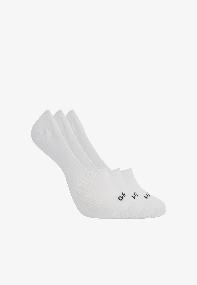 Trois paires de chaussettes blanches invisibles avec un petit logo noir sur la zone des orteils, affichées en chevauchement sur un fond blanc.