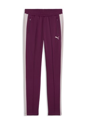 Fialové športové nohavice s bielymi bočnými pruhmi, elastickým pásom, vreckami na zips a malým bielym logom Puma na pravom stehne.