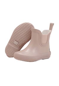 Bottes de cheville en caoutchouc rose avec des côtés élastiques, semelles texturées et tirants renforcés. Fini lisse avec un petit talon. Adaptées aux conditions humides.