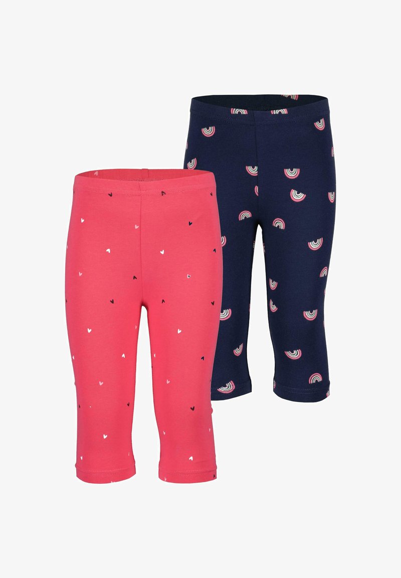 To sæt leggings: ét lyserødt med små hvide og sorte hjerter, ét marineblåt med farverige regnbueprint. Begge er lavet af blødt, strækbart stof.