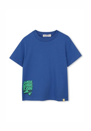 T-shirt en coton bleu avec un imprimé graphique vert et le texte « DEVINE OÙ JE SUIS » sur le côté inférieur gauche. Manches courtes et col rond.