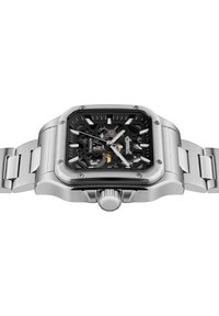 Square stainless steel watch with a black skeleton dial, silver hour markers, and a polished linked bracelet. Notable crown at side.