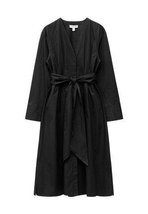 Black wrap dress made of lightweight fabric, featuring a deep V-neckline, long sleeves, and a removable tie belt at the waist.