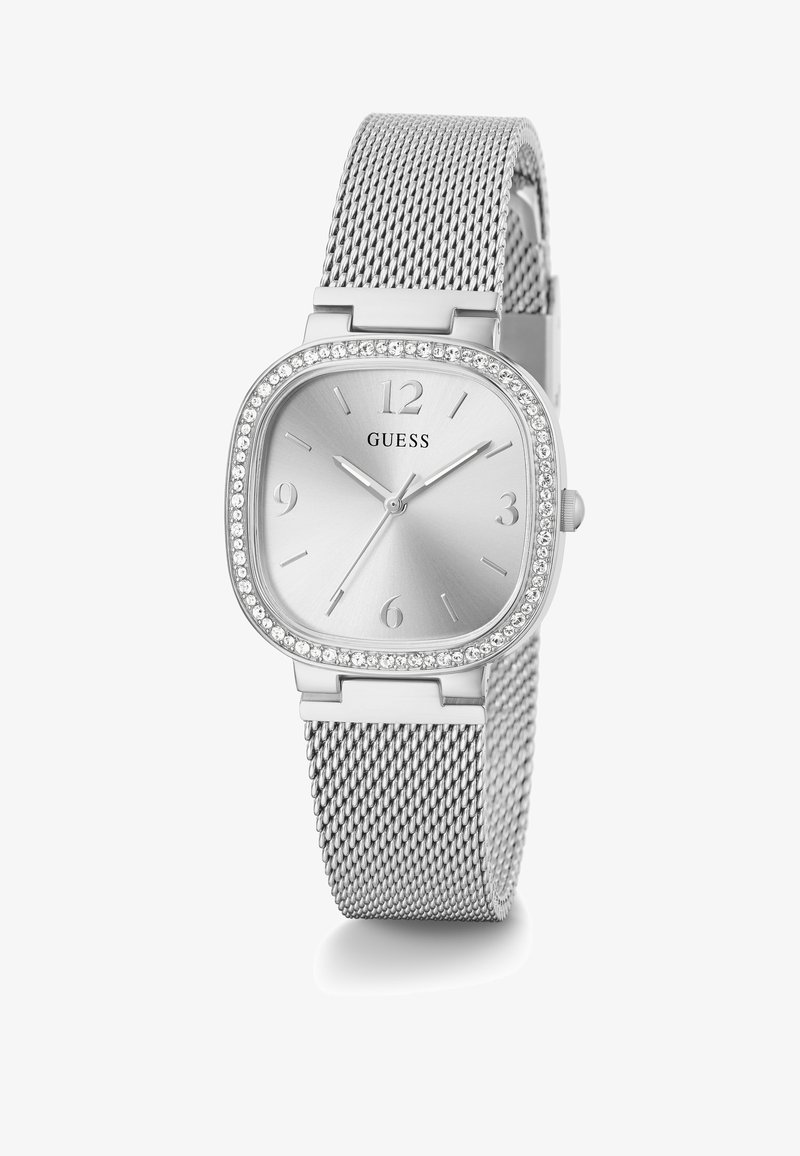 Silberne quadratische Uhr mit einem metallischen Mesh-Armband, einem funkensprühenden Rahmen und einem gebürsteten silbernen Zifferblatt mit Stundenmarkierungen und Logo auf 12 Uhr.