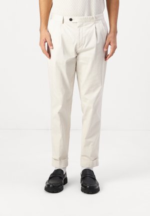 Nohavice chinos - sand