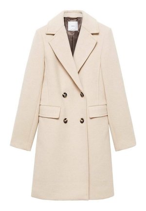 Beige double-breasted coat with large notched lapels, side pockets, and black buttons. Smooth wool blend fabric with structured silhouette.