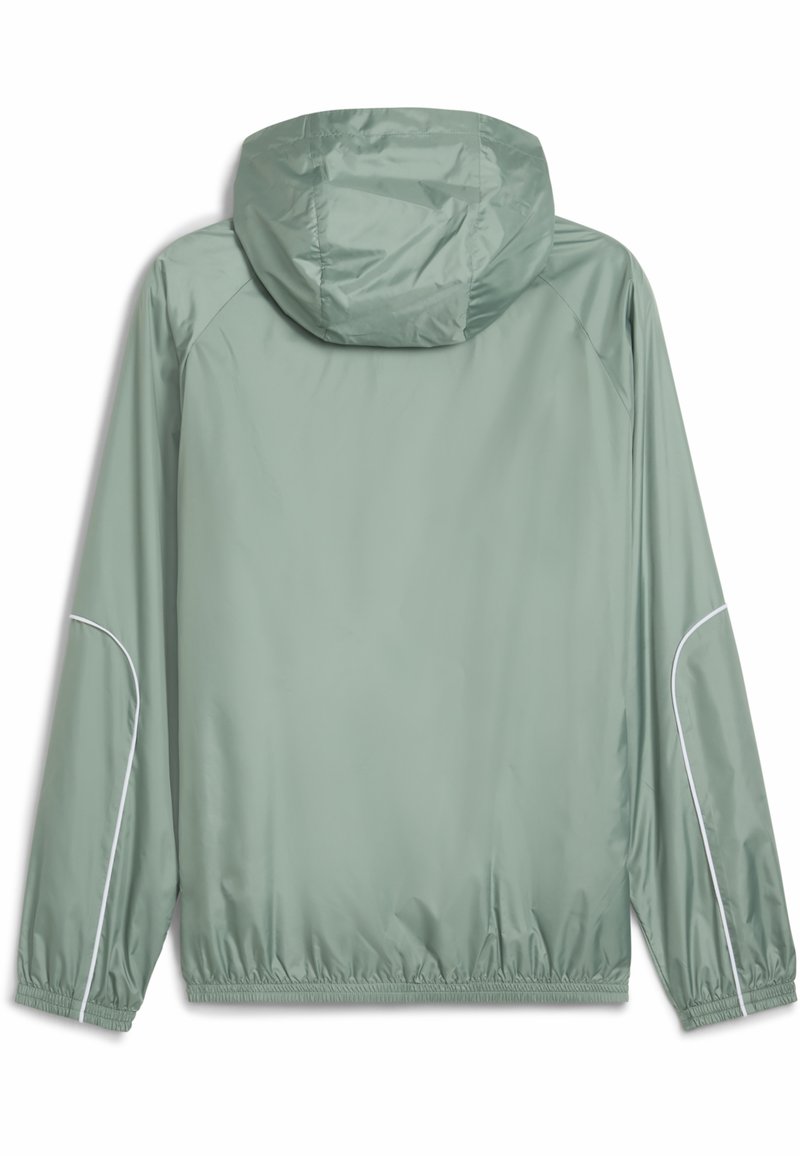 Hellgrüne Windjacke mit Kapuze, elastischen Bündchen und Saum, mit weißen Akzentpaspeln an den Ärmeln. Glatte, wasserabweisende Oberfläche.