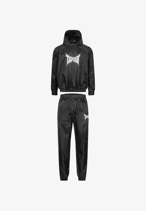 Black tracksuit made of shiny, lightweight material. Features a hooded jacket with elastic cuffs, matching elastic waistband pants, and logo details.