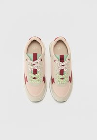Light pink mesh sneakers with maroon accents, mint green eyelets, and flat cream laces. Features a rounded toe and textured sole.