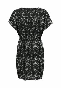 Robe noire longueur genou avec des pois blancs, manches courtes et ceinture cintrée à la taille, présentée à plat vue de dos.