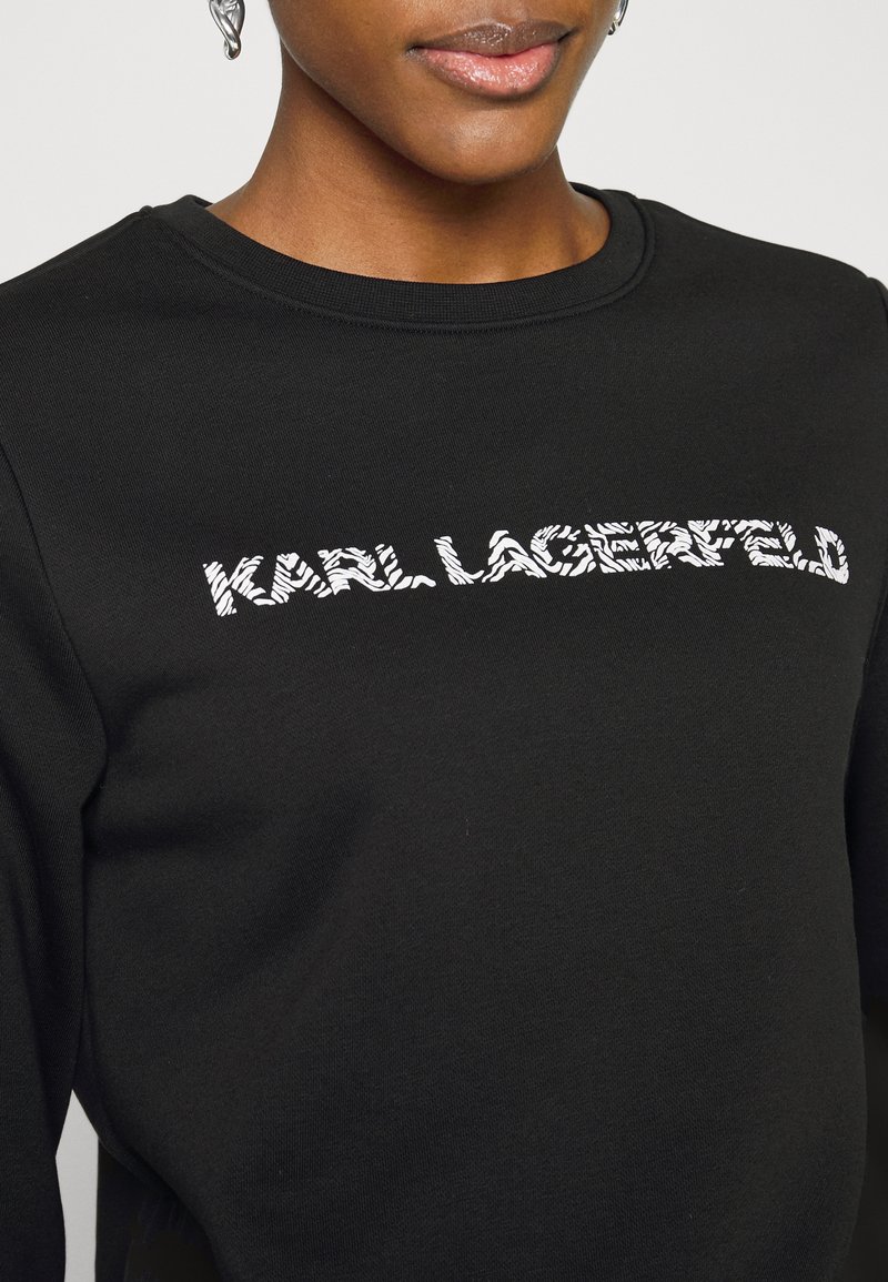 Damen Sweatshirts | KARL LAGERFELD ELONGATED LOGO ZEBRA Sweatshirt black/schwarz - KF66083 Damen Sweatshirts | KARL LAGERFELD ELONGATED LOGO ZEBRA Sweatshirt black/schwarz - KF66083