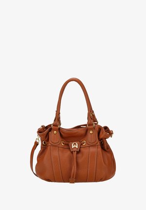 Sac à main en cuir marron avec deux poignées, garnitures dorées et détail de fermeture à cordon sur le devant.