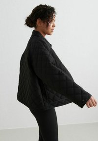 aim’n® QUILTED FEMME - Light jacket - black