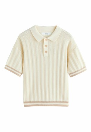 Short-sleeve polo shirt in cream with ribbed texture, three button placket, and light brown accents at collar and hem.