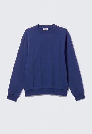 Granatowy sweter z miękkiej bawełny, z okrągłym dekoltem, ściągaczami przy mankietach i u dołu. Posiada luźny krój oraz minimalistyczny design.