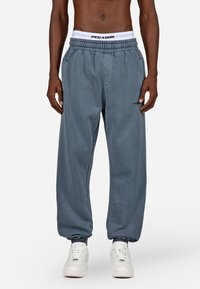 Pegador LOGO JOGGER - Treniņtērpa apakšdaļas - vintage shadow blue