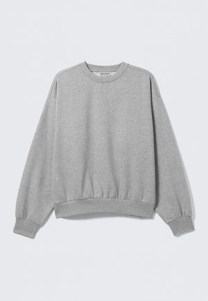 Gray sweatshirt made of soft fabric, featuring a round neckline, long sleeves, ribbed cuffs, and hem, with a slightly cropped fit.