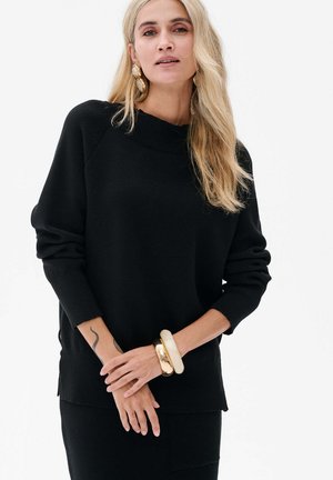 - Sweter
